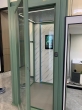 Home elevator with sliding door